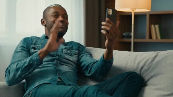 Smiling Mature African American Man Sitting Comfortable Sofa Room Talk — Video Stock
