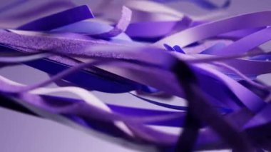 Abstract blue purple violet silk ribbons waving. Fashion background. Cut torn tape ribbon wave cloth satin color fabric. Looped animation. Wavy fluttering material 3D animation motion design wallpaper