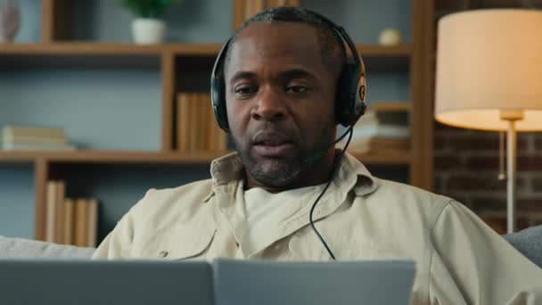 Mature African American Man Headphones Remote Discuss Partner Online Conference — Video Stock