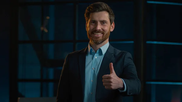 Business office portrait man caucasian happy businessman middle-aged boss approve business idea good result thumb up respect symbol positive reaction recommend excellent choice approval hand gesture