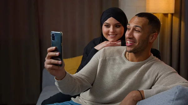 African American Muslim Couple Holding Video Call Conversation Home Virtual — Stockfoto