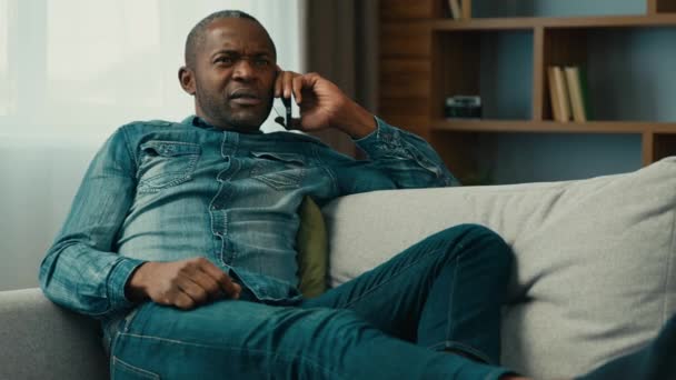 Mature African American Man Lying Couch Talk Mobile Phone Answer — Stock Video