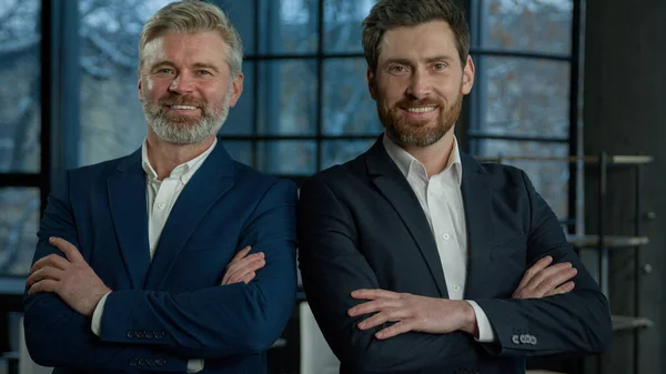 Two Successful Smiling Businessmen Posing Together Crossed Arms Young Mature — Foto de Stock