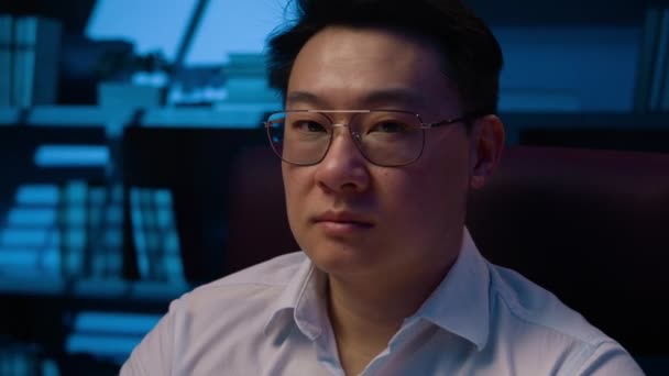 Close Portrait Asian Businessman Glasses Night Office Serious Korean Man — Stock Video