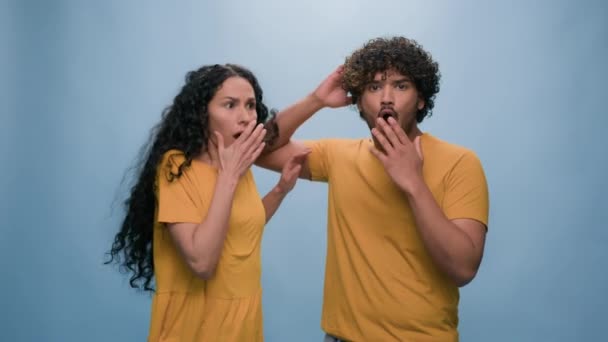 Multiracial Shocked Scared Afraid Couple Amazed Shocked Hispanic Woman Hiding — Stock Video