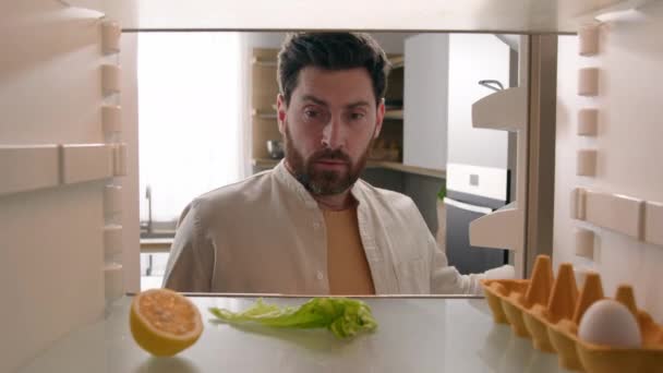 Hungry Man Guy Open Empty Refrigerator Half Lemon Lettuce Leaf — 图库视频影像