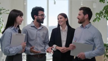 Successful business team portrait diverse office co-workers multiracial colleagues group of businesswomen businessmen multi ethnic women men smiling together corporate leadership professional teamwork