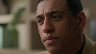 Close up portrait thoughtful doubtful African American man pensive male businessman business entrepreneur think deep in thoughts difficult question pondering search problem solution thinking decision
