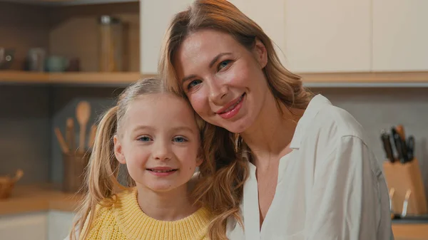 Caucasian Happy Family Kitchen Close Smiling Child Daughter Cuddling Mom — Stok fotoğraf