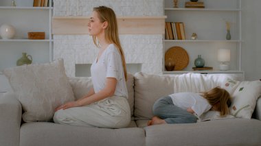Little abuse child girl sad upset daughter adopted kid ignore unhappy offended mother family disagreement sitting at home couch looking to different sides annoy relationship problem conflict quarrel