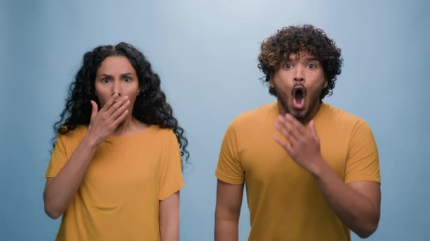 Hispanic Indian Arabian Couple Blue Studio Background Shocked Bad News — Stock Video