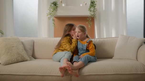 Little Caucasian Girls Kids Children Sisters Friends Daughters Couch Living — Stock Video