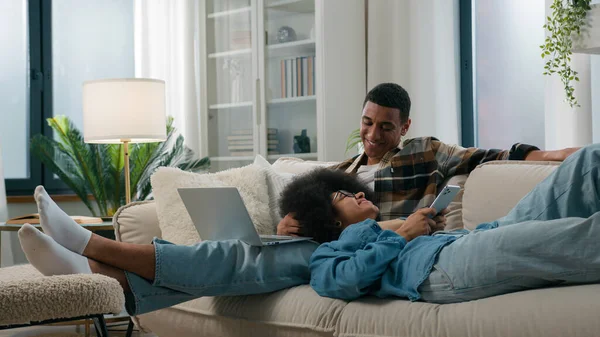 Chilling African American Relaxed Couple Couch Home Together Gadget Internet — Stock Photo, Image