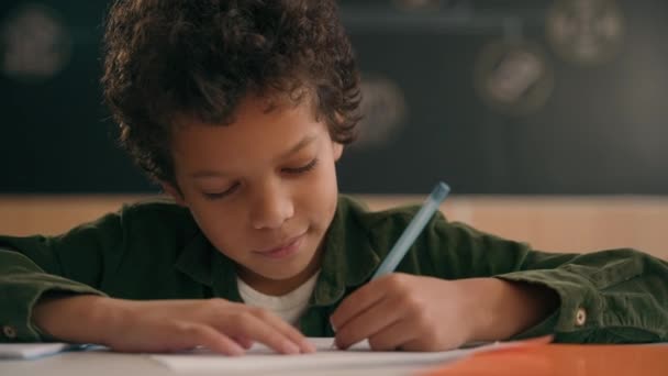 Little African American Guy Boy Writing Notes Task Class Lesson — Stock Video