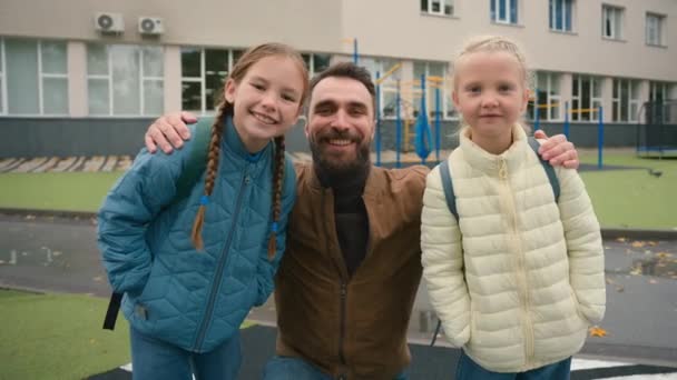 Happy Family Man Two Girls Dad Daughters Schoolgirls Students Primary — Stock Video