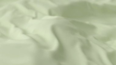 Soyut duyarlılık yeşil sarı kırmızı ipekten arka plan lüks dalga kumaş saten renkli kumaş. Süt sıvısı sıçraması, dalgalı sıvı dokusu. Çırpınan maddeler. 3B animasyon hareket tasarımı