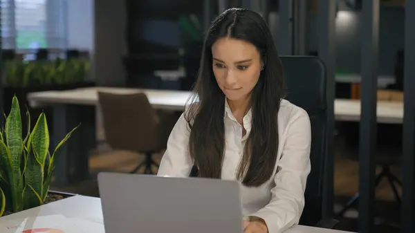 stock image Successful positive happy smiling Caucasian businesswoman female office worker manager employer secretary specialist smile business woman girl lady working with laptop online work computer chat client