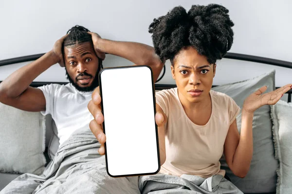 Puzzled Upset African American Couple Spouses Sit Cozy Bed Bedroom — Stock Photo, Image