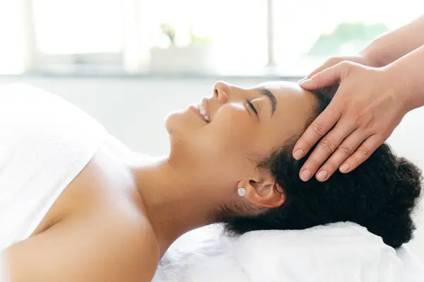 Female Massage Therapist Doing General Forehead Massage Pretty Girl Side Stock Image