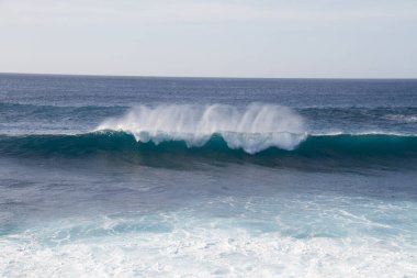 beautiful ocean waves crashing on the beach