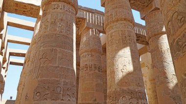 The Temple of Karnak, Luxor, Egypt. Great Hypostyle Hall with Hieroglyphics on Pillar. clipart