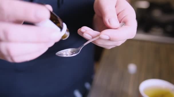 Sedative Drops Woman Holds Bottle Medicine Her Hands Drips Spoon — Stock Video
