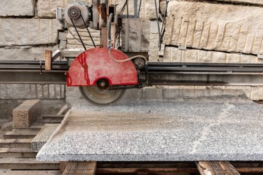 saw used to cut pieces of granite