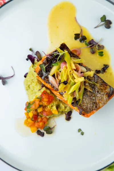 red fish with vegetable sauce and puree