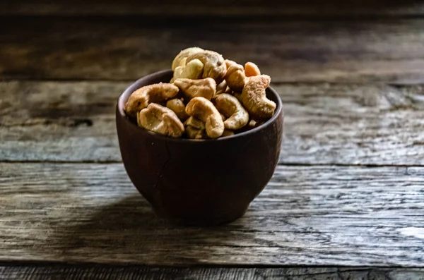 Cashew nuts roasted in a ceramic bowl.