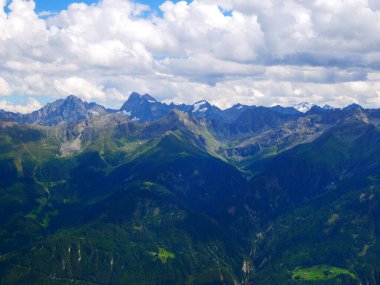 View on mountains near ski resort Serfaus Fiss Ladis on a summer day,mountains, sky, clouds.  Alps, Austria.  clipart