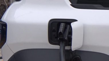 Elektrikli araç şarj istasyonu, şarj adam