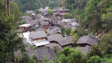 Beautiful view of Ban Mae Kampong village surrounded by evergreen forest, a peaceful village in Mae On sub-district, Chiang Mai, northern Thailand.