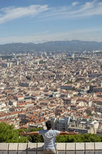 Young guy mediating the city of Marseille in France