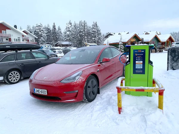 Tesla Red Passenger Electric Car Replenishes Battery Charging Station Levi — Stock Photo, Image
