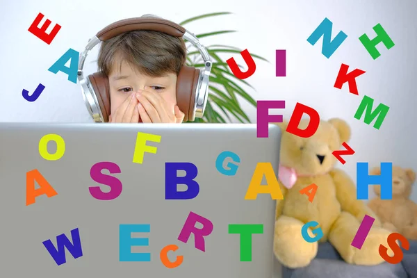 different letters against background of child 7 years old at laptop, learning difficulties, speech disorders, dyslexia awareness, help children with reading, human brain development concept