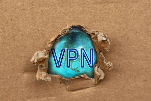 Virtual Private Network through hole in cardboard form, virtuelles Netzwerk, business VPN solutions for enterprise to secure data communications and extend private network services while maintaining
