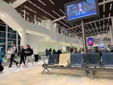 Flight Departures information board Bahrain Airport waiting room, schedule on electronic scoreboard, concept passenger traffic, delay, flight cancellation, arrival time, Bahrain - October 2022