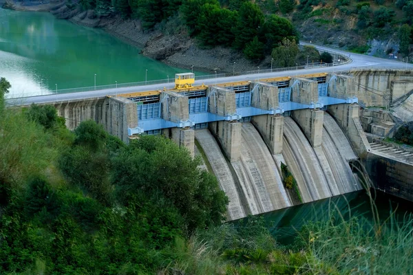 stock image dam on river, Reservoir Condo del Guadalore, hydroelectric power plant, source using energy water stream, natural mountain resort El Chorro gorge, mountains andalusia, concept ecology, clean energy