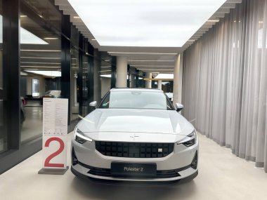 white all-electric Polestar 2 car model in Studio Frankfurt, part of Volvos EV subsidiary, Dual-motor examples, alternative energy development concept, Germany, Frankfurt - January 2023   