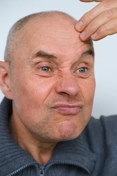 Close Male Face Makes Negative Grimaces Aggression Mature Man Senior — Stock Photo, Image