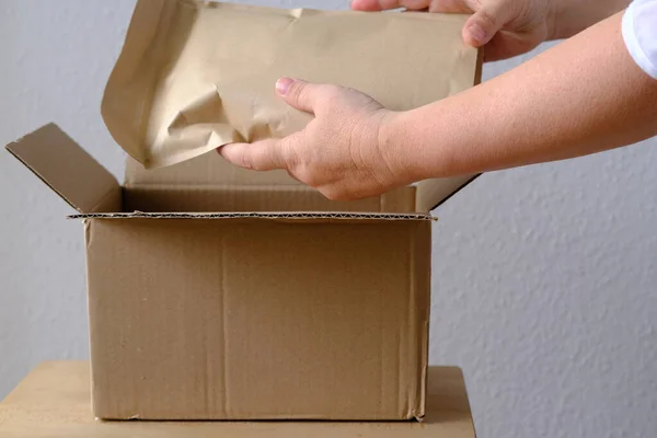 Close Female Hands Take Out Package Open Cardboard Box Medium — Stockfoto