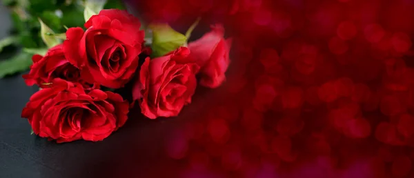 rose bouquet, Valentine\'s Day, Mother\'s Day, wedding banner, red texture with bokeh, background for design, postcards, concept of marriage proposal, Valentine\'s Day, holiday card
