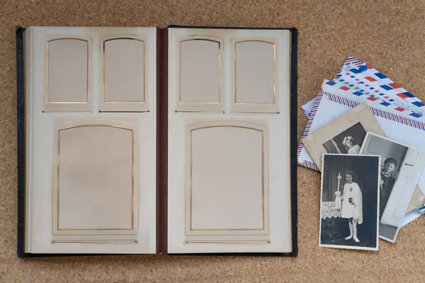 old family photographs, vintage album, home archive documents, concept of family tree, genealogy, memories, memory of ancestors, family tree, nostalgia, old-fashioned snapshots, retro aesthetics