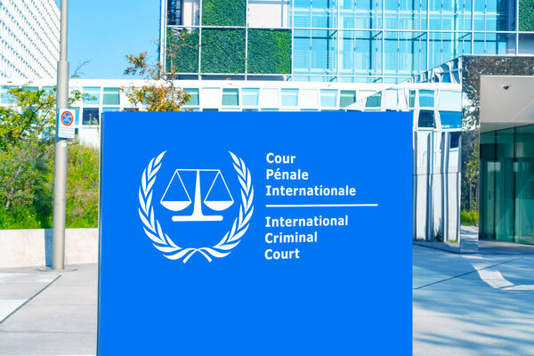 building of International Criminal Court with (ICC) in Hague, logo, text on blue flag background, poster banner template design, anniversary Rome Statute, Hague, Netherlands - September 10, 2023