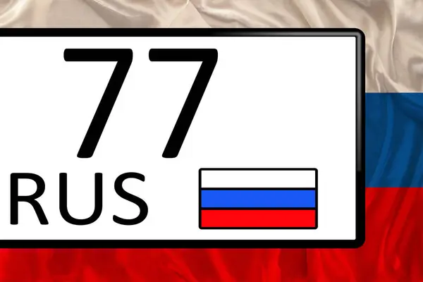 Russian Vehicle registration license plate, registration mark with 77 automobile code of regions of Russia Moscow and flag of Russian Federation, EU sanctions