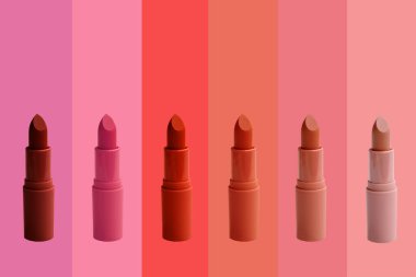 collection of matte lipstick tube on background, red, raspberry, pink, coral, peach color close-up, concept of decorative cosmetics, Makeup trends, Cosmetic elegance, Beauty industry clipart