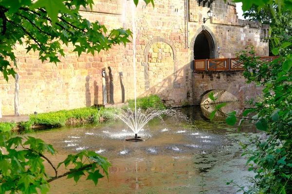 fountain in castle courtyard, ruins of Filbel Fortress Ancient European medieval buildings Bad Vilbel, Showcasing attractions for tourists interested, Cultural Tourism in Hesse