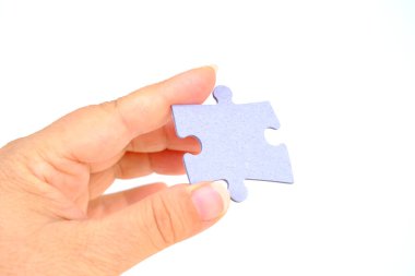 Kadın eli mukavva yapboz parçası, mantıksal beceriler, bulmaca çözme ve hafıza geliştirme, tamamlamak için iş kavramı