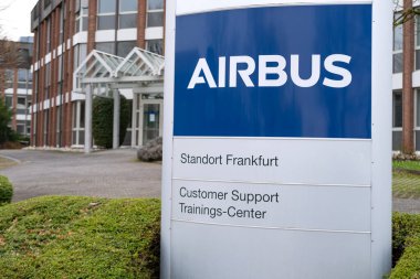 corporate banner Airbus front office building, related to development aviation infrastructure, largest European aerospace corporation, impact on economy, Frankfurt, Germany - February 10, 2024 clipart