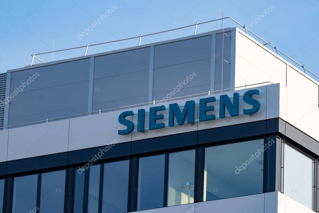 Siemens logo, office German conglomerate Siemens AG operating of electrical engineering, electronics, energy equipment, transportation and communications in Frankfurt, Germany - February 29, 2024